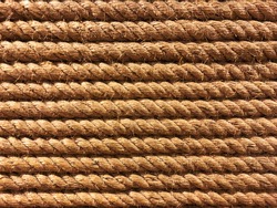 seamless tied rope in a row in parallel line background in closeup full frame.