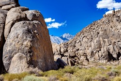 A Rock climber in the rocks of Alabama Hills making an ascent