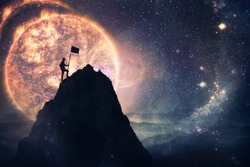 Self overcome concept as a man leader climbing a tall mountain carrying a flag to the top. Road to win and success over starry night sky cosmic background. Achieving goals symbol.