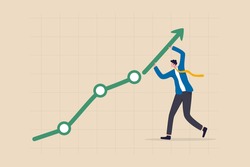 Career growth or business achievement, stock market rising up from economic recovery concept, businessman carrying arrow to make stock rising boom graph and chart.
