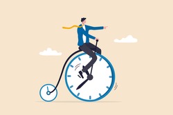 Productivity or efficiency spending time to finish work, time management or work life balance concept, businessman riding vintage bicycle with front wheel as clock and small wheel as stopwatch timer.