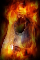 Acoustic guitar with fire flame screen.