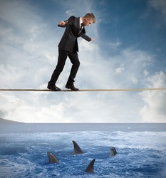 Concept of risk with businessman and shark