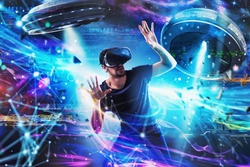 Shocked boy plays with online ufo videogames. Concept of technology and entertainment