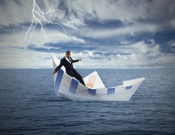 Concept of crisis and economic collapse with sinking boat