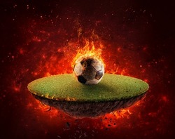 Round portion of football ground with fiery soccer ball