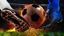 Soccer players with fiery soccerball during the match