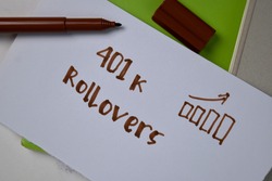 401k Rollovers text on sticky notes isolated on office desk.