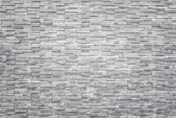 Pattern of black slate wall texture and background. Interior or exterior decoration.