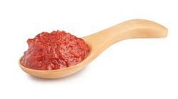 natural tomato paste in wooden spoon isolated on white.