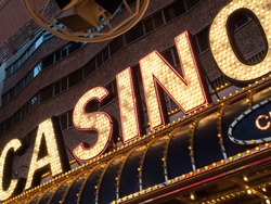 Neon casino sign lit up at night, Las Vegas, Nevada, USA