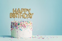 Birthday cake with gold happy birthday banner