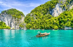Phuket beach boat on Thailand landscape