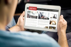 Online news article on tablet screen. Electronic newspaper or magazine. Latest daily press and media. Mockup of digital portal and website. Happy person using web service in the morning. Reading text.