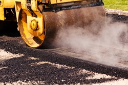 asphalting of the road with steamroller