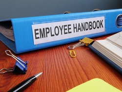 Text sign showing the printed words Employee Handbook