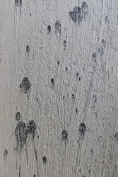 Black and white plaster and paint splotches textured background
