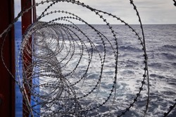 Barbed wire as anti-piracy measure on deck of a merchant ship