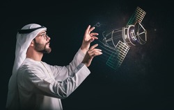 Future digital technology metaverse game and entertainment, Arabic man having discovering the univers using virtual reality hologram. the concept of technologies of the future.