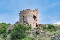 View tower of Chembalo fortress. Medieval architecture monument, landmark. Ruined stone Genoese fortress in Balaclava in  Crimea 