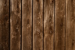 Unpainted weathered wooden fence texture