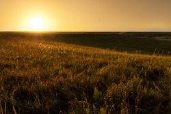 Dramatic sunrise photo at the Kansas Tallgrass Prairie Preserve Park.
