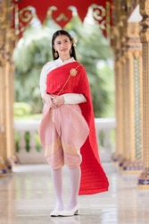 Portrait of a beautiful thai woman wearing a thai dress,Thai girl in retro Thai dress,Beautiful Thai girl in traditional dress costume