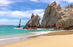Scenic travel destination beach Playa Amantes, Lovers Beach known as Playa Del Amor located near scenic Arch of Cabo San Lucas.