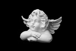figurine: white angel on a black background, Valentine's Day, New Year