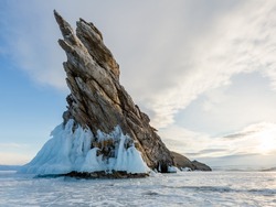 Rocks in ice on the southern tip of Ogoy Island, Small Sea, Lake Baikal, Russia