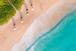 Aerial drone top view crowd of happy people relax at tropical Beach with sunset in Phuket, Thailand, Beautiful Phuket beach is famous tourist destination at Andaman sea. Holiday summer concept
