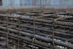 Reinforcing steel Beam for building, Construction work. Rebar steel bars, reinforcement concrete bars with wire rod used in construction site. Using steel wire for securing steel bars with wire rod