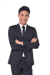 Business young man in suit,tie with, cross arms  isolated studio. Happy business professional man smile in formal suit isolated on white background