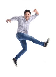 young casual man jumping for joy