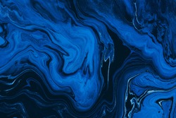 Classic blue color of the year 2020. Abstract fluid acrylic painting. Modern art. Marbled blue abstract background. Liquid marble pattern