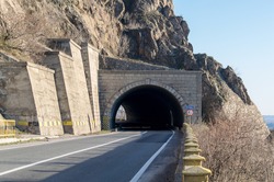 The highway that crosses the mountains. Road tunnel, infrastructure
