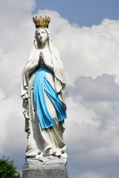Statue of Our Lady of Immaculate Conception. Lourdes, France, major place of catholic pilgrimage.  
