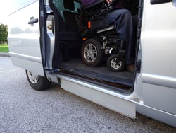 Disabled Men on Wheelchair using Accessible Vehicle with Lift