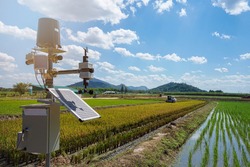 Agriculture technology, artificial intelligence (AI) concepts, Smart farmer use smart farm wireless control agricultural machinery replace worker and increase precision.