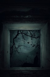 Old damaged window wall with cross, church, dead tree, full moon, birds and spooky cloudy sky, Halloween mystery concept