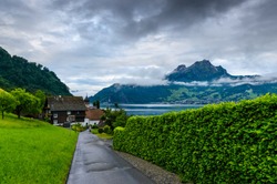 An idyllic landscape at village Kehrsiten on the banks of Lake Luzern, Switzerland.