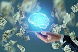 Hundred dollar bills fall on a smartphone with a Brain hologram. Technology concept, exchange of knowledge for money, business
