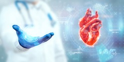 The doctor looks at the Heart hologram, checks the test result on the virtual interface, and analyzes the data. Heart disease, myocardial infarction, innovative technologies, medicine of the future