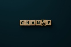 Wooden blocks with the word CHANGE changing the letter G to C so that the word CHANCE appears.