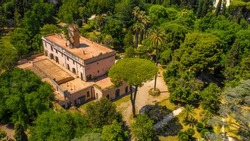 Aerial view of Villa Sciarra, a park in Rome, Italy. The villa is at center of the park. It is located in Trastevere district.