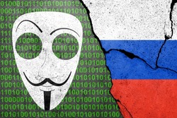 Anonymous hacker cyber attack. Flag of Russia painted on a concrete wall