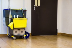 Professional cleaning equipment in corridor. Miscellaneous tools and items.