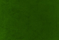 The texture of the bright green velvet. The background of bright green cloth. Background of     bright green velvet