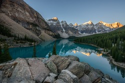 Moraine Lake is a glacier lake in Banff National Park, Canada. It lies fourteen kilometres from the village of Lake Louise in the Valley of the Ten Peaks