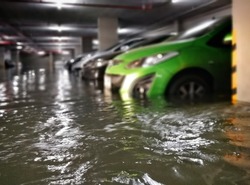 flooding car in  basement carpark at condominium ,Bangkok,Thailand